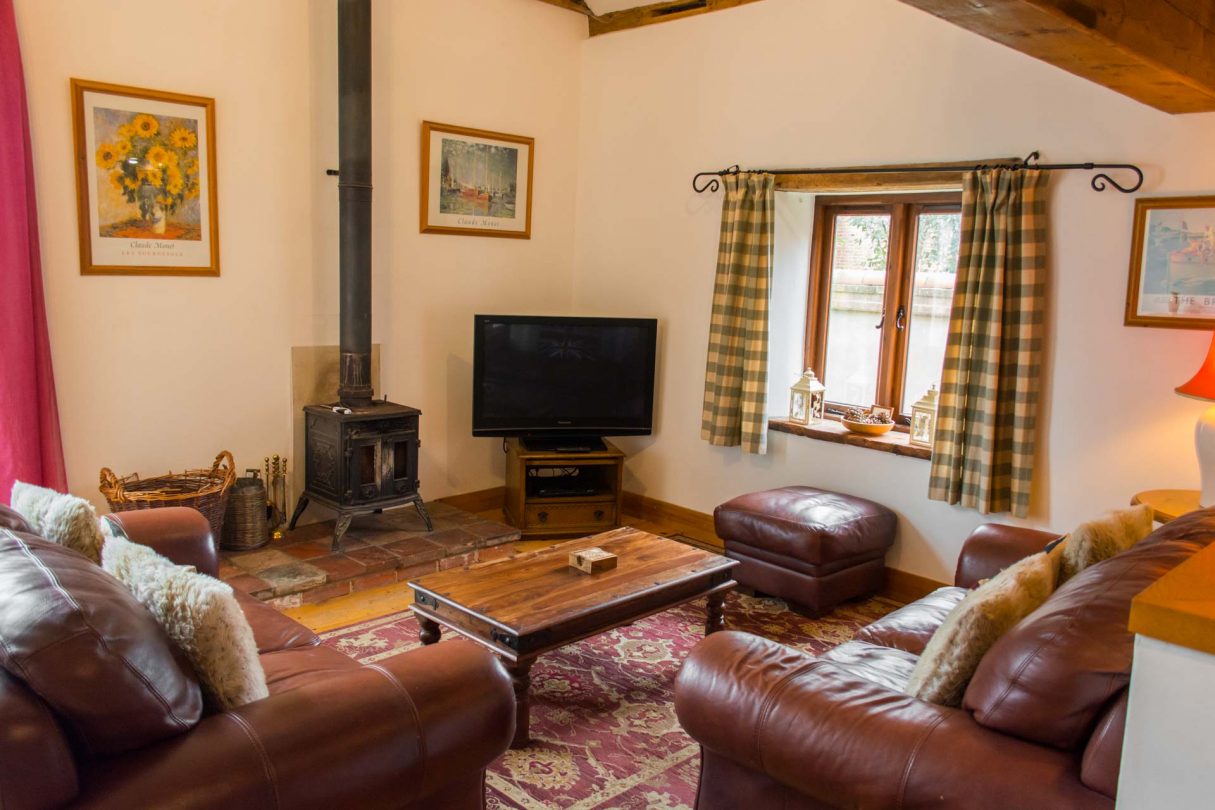 Interior shot of rural property shire horse barn showing the living area and furnishings