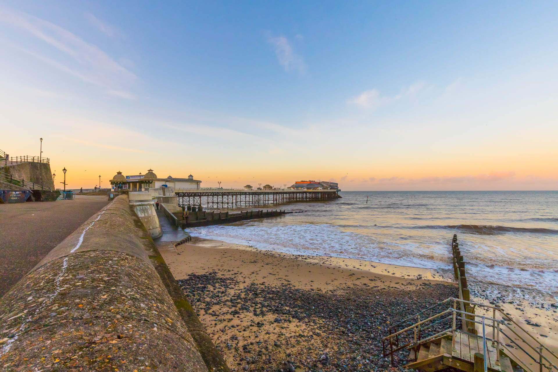 Cromer pier and seaside with a beautiful sunset.