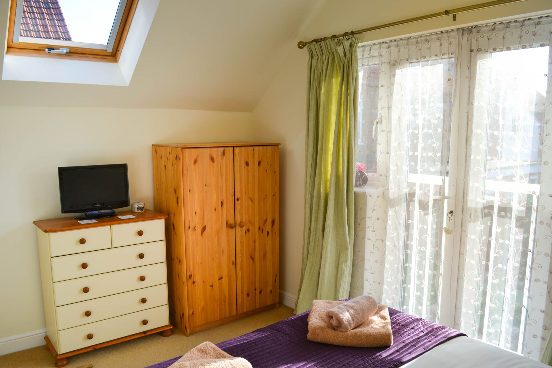 Seaside holiday home king-size bedroom.