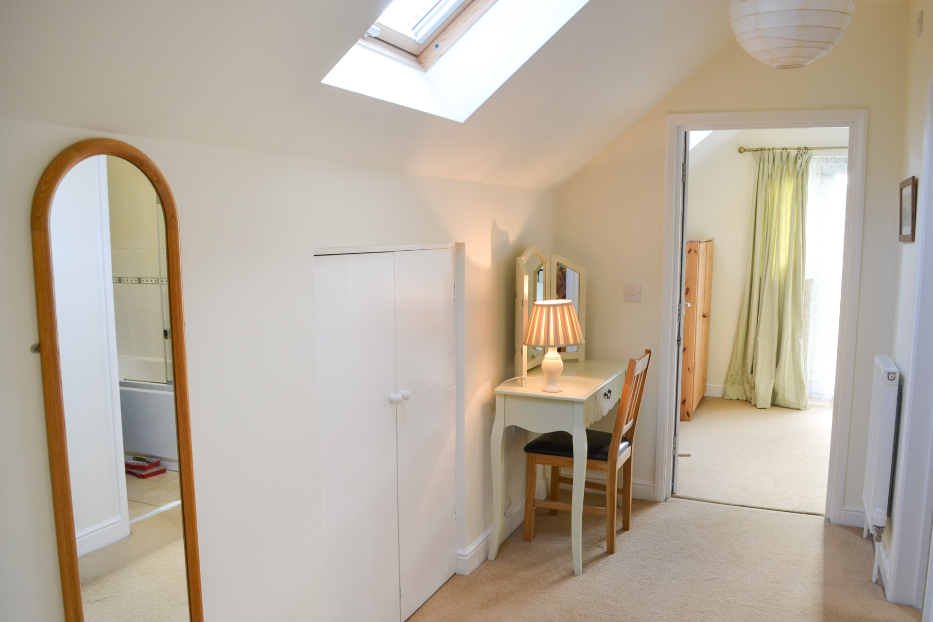 Dressing table and lamp.