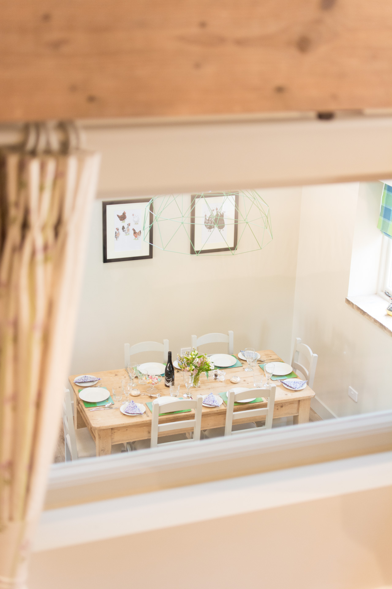 Twin room interior window which looks over the dining area.